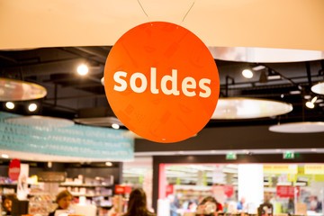 A panel sales in a shop in France write soldes means sale