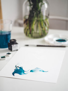 watercolor map on white table 