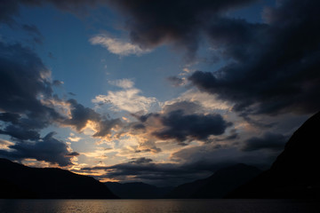 Sky with clouds by the sea during sunset in Norway