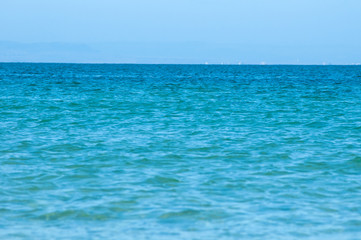 Fototapeta na wymiar Perfect turquoise sea and blue sky in the summer.
