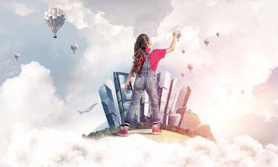 Concept of careless happy childhood with girl dreaming about fut