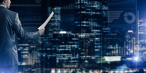 Digital background with infographs and man extending papers or c