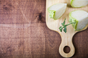 Chopped kohlrabi on chopping board