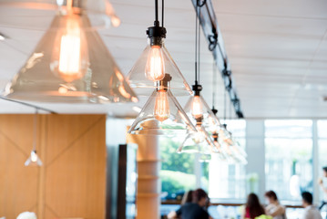 hanging ceiling lights in a modern shared office space