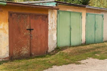 Old brick garage. Parking place for cars. Parking places in the old part of town.