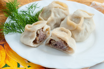 Beef manta dumplings with meat on the plate