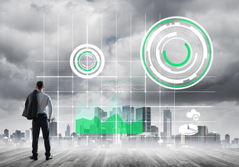 Pensive businessman looking at user interface against modern city background