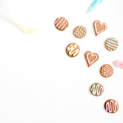 Colorful hand made cookies on white background. Flat lay, top view.