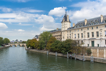 Fototapeta na wymiar Paris, Prefecture de police on the Seine, in Saint-Michel, quai des Orfevres, and view of the Pont-Neuf 