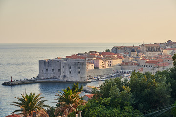 Fototapeta na wymiar Sunset lights over Dubrovnik harbour