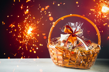 gift basket with festive sparklers particles