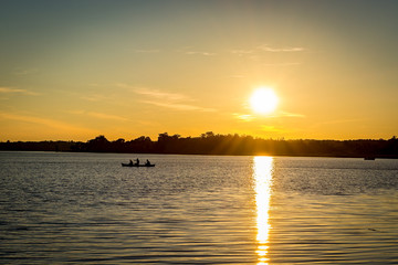 canoe on a lake silhouette 