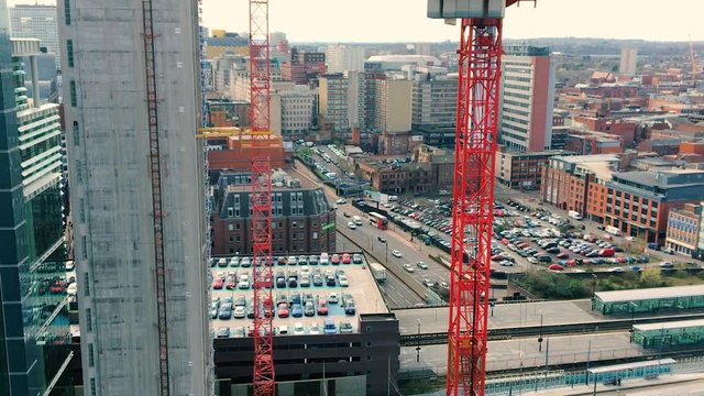 Another Concrete Skyscraper is constructed by crane in Birmingham City Centre 