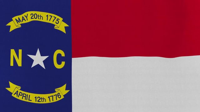 Loopable: North Carolina flag...Flag of state North Carolina waving in the wind...Seamless loop...Made from ultra high-definition original with detailed fabric texture.