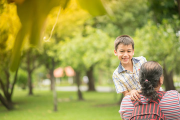 Father and sons in the park