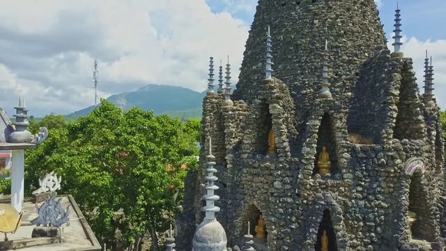 Camera Flies along Amazing Ancient Coral Buddhist Temple