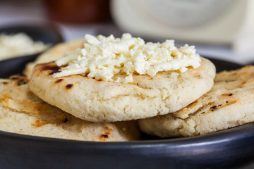 Traditional Colombian white corn arepa with cheese