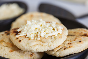 Traditional Colombian white corn arepa with cheese