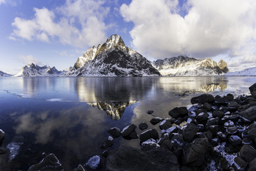 reflection of mountain chain in Lofoten - 169063815