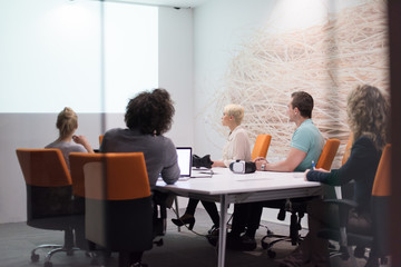 Startup Business Team At A Meeting at modern night office building