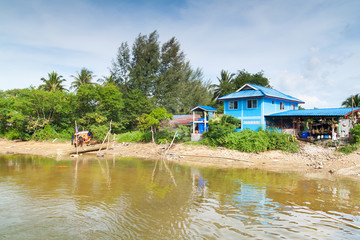 Fototapeta na wymiar Traditional house with river in Thailand