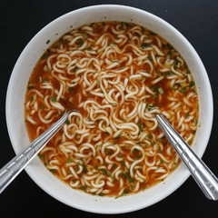 hot instant noodles tasty spicy in a bowl, asian food