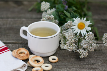 a cup of herbal tea with bagel
