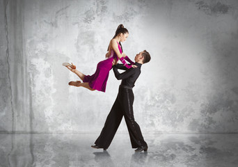 Couple in the active ballroom dance