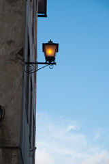 Fototapeta na wymiar Illuminated street lamp during day.