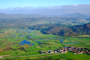 Planinsko polje is a typical karst field that is exposed to floods of the Unica river.