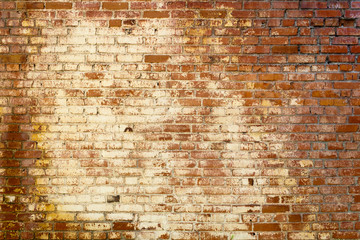 Old colored brick wall texture grunge background