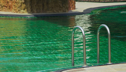 ladder in the swimming pool.