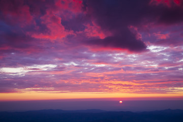 Naklejka na ściany i meble pink sunset or sunrise with beautiful clouds on the sky