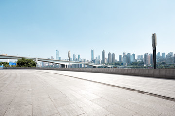 empty marble floor and cityscape of modern city