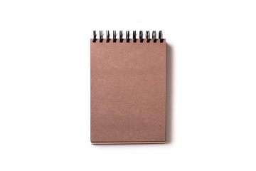 Vertical aligned isolated notebook mock up with blank white sheets on white background. Top view, flat lay.
