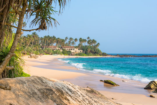 Fototapeta The Amanwella beach in Tangalle in the southern province of Sri Lanka. The coastal town has a majestic bay and the most beautiful beaches in the south and south-east 