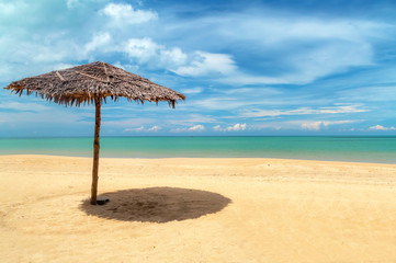 Beautiful tropical beach with parasols, Thailand