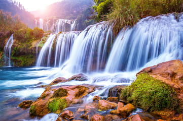 Jiulong waterfall in Luoping, China. - obrazy, fototapety, plakaty
