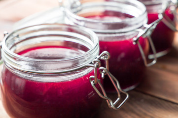 Close Up View Of Jars With Sweet Tasty Yummy Red Jam