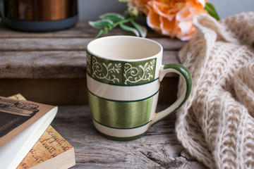a vintage cup on the wood (close up)