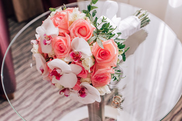 bridal bouquet from roses and orchids
