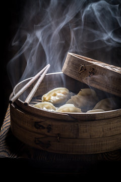 Hot and tasty chinese dumplings in bamboo steamer
