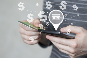 Businessman pressing button credit card looking account dollar currency on phone