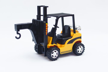 Yellow Toy Forklift Isolated On White Background
