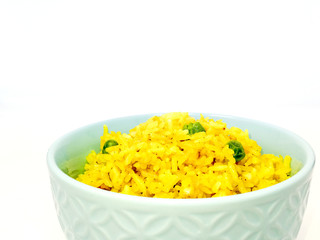 Homemade Chinese fried rice with vegetables and fried eggs