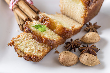 Homemade cinnamon cake and almonds