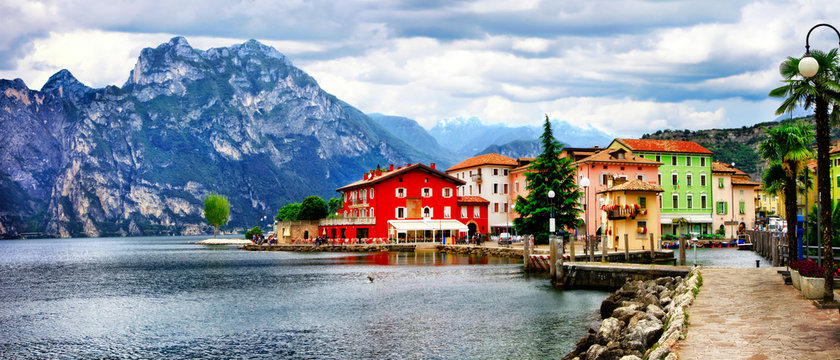 Alpine scenery - beautiful lake Lago di Garda and village Torbole. Italy