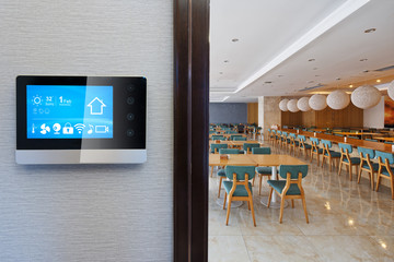 smart screen on wall with modern cafeteria