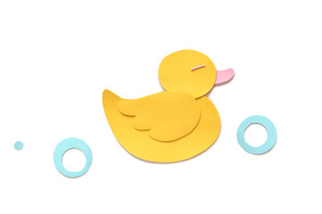 Rubber duck paper cut on white background - isolated