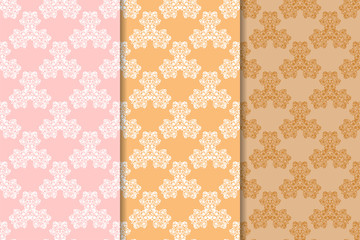 Orange set of floral ornaments. Seamless patterns